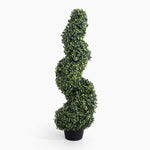Artificial spiral topiary plant in a pot on a white background