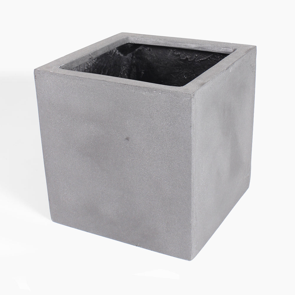 A square fiberstone planter pot with a rough, textured gray exterior and a dark interior, shown on a plain white background.
