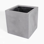 A square fiberstone planter pot with a rough, textured gray exterior and a dark interior, shown on a plain white background.
