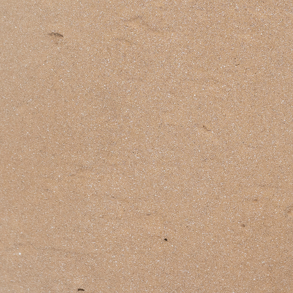 Close-up of beige sand texture