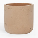 Beige ceramic planter on a white background