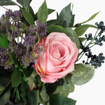 Artificial berry and bramble bunch faux berry and cow parsley close-up