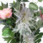Artificial berry and bramble bunch faux thistle close-up