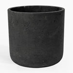 Black cylindrical pot on a white background