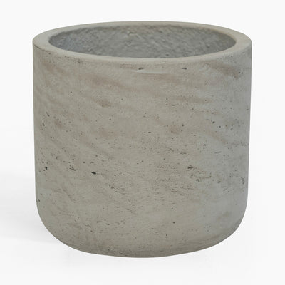 Concrete pot with textured surface on a white background