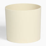 Beige ceramic planter on a white background