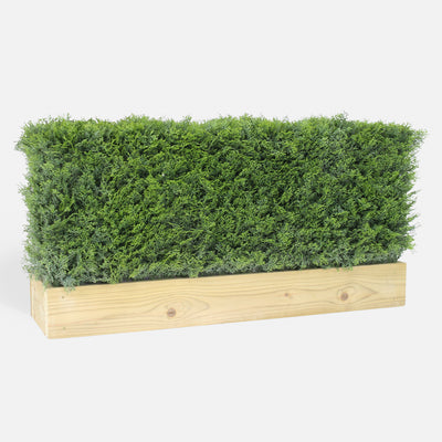 Rectangular wooden planter with artificial greenery on a white background