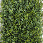 Artificial green bush on a white background
