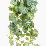 Artificial green leaf garland on a white background
