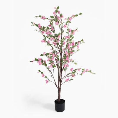 Artificial cherry blossom tree with pink flowers in a pot on a white background