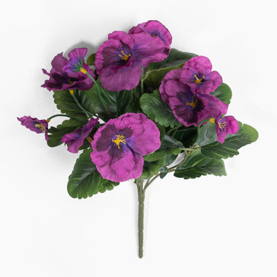 Bouquet of purple flowers with green leaves on a white background