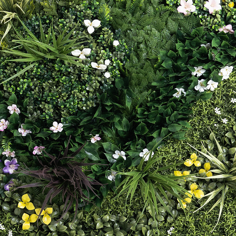 Various green plants and flowers arranged in a circular pattern