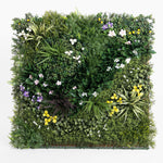 Square arrangement of various green plants and flowers on a white background