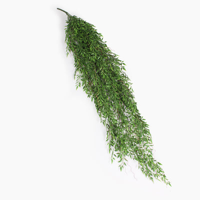 A long, cascading artificial green leafy plant on a spike with dense foliage, shown at an angle against a plain white background.