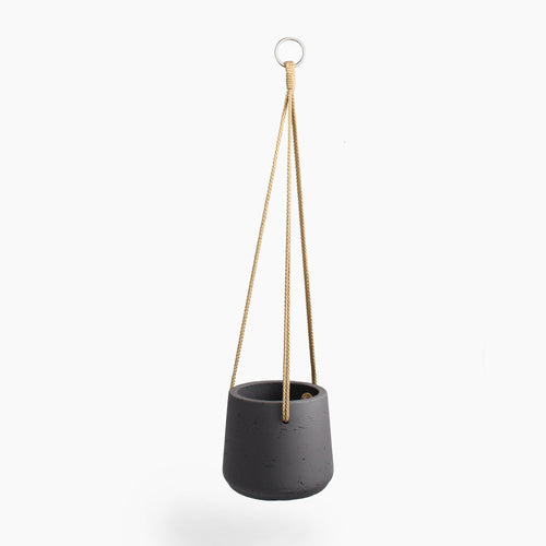 Gray hanging planter with a rope on a white background