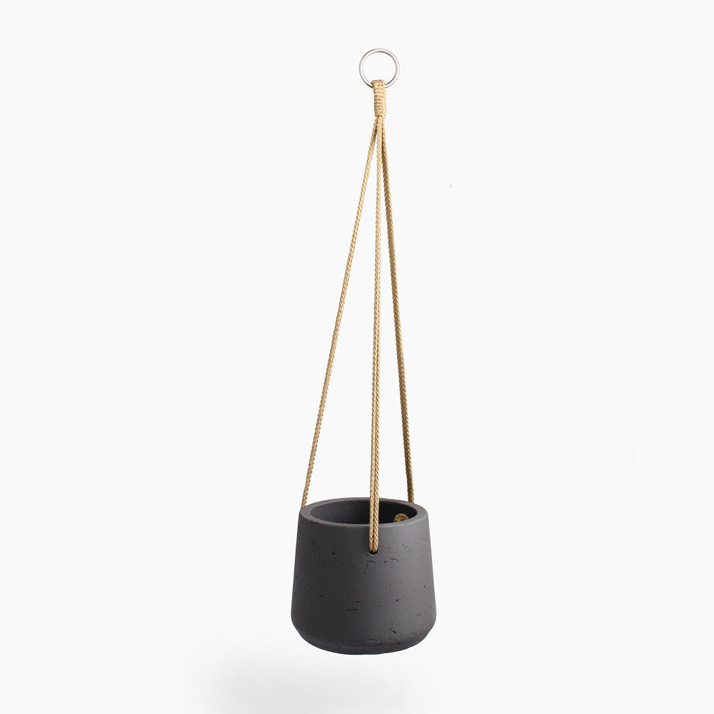 Gray hanging planter with a rope on a white background