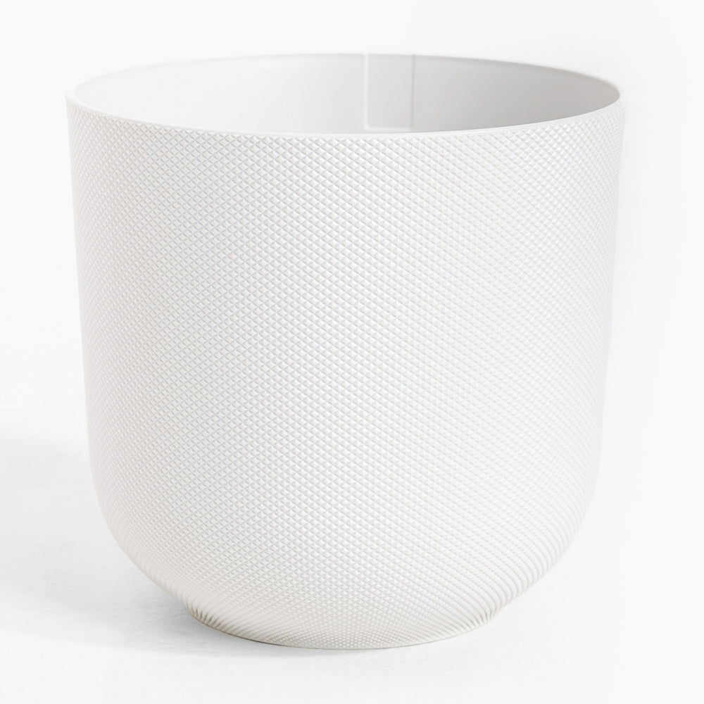 White textured vase on a white background