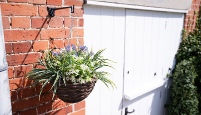 Stylish winter hanging basket ideas with artificial flowers