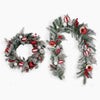 A festive holiday garland set featuring a circular wreath and a garland, both decorated with faux snow, green pine branches, red berries, red and white striped ornaments, and frosted doughnuts, shown against a plain white background.
