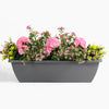 Artificial geranium & starflower pink flower window box arrangement
