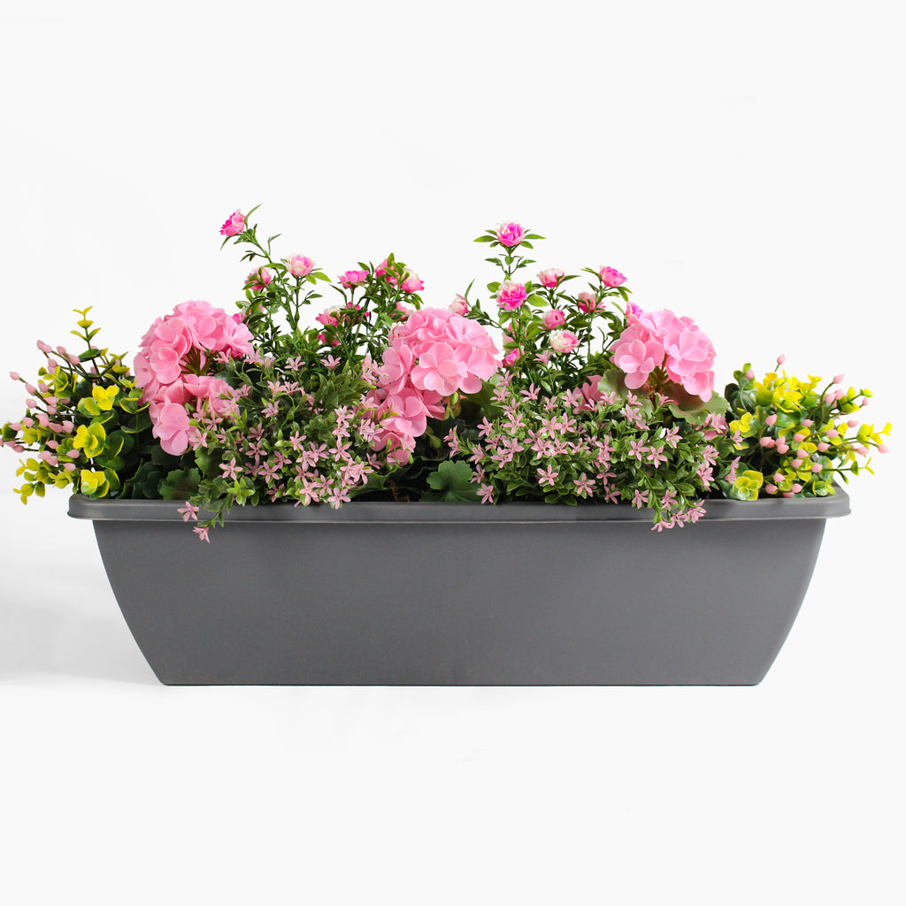 Artificial geranium & starflower pink flower window box arrangement
