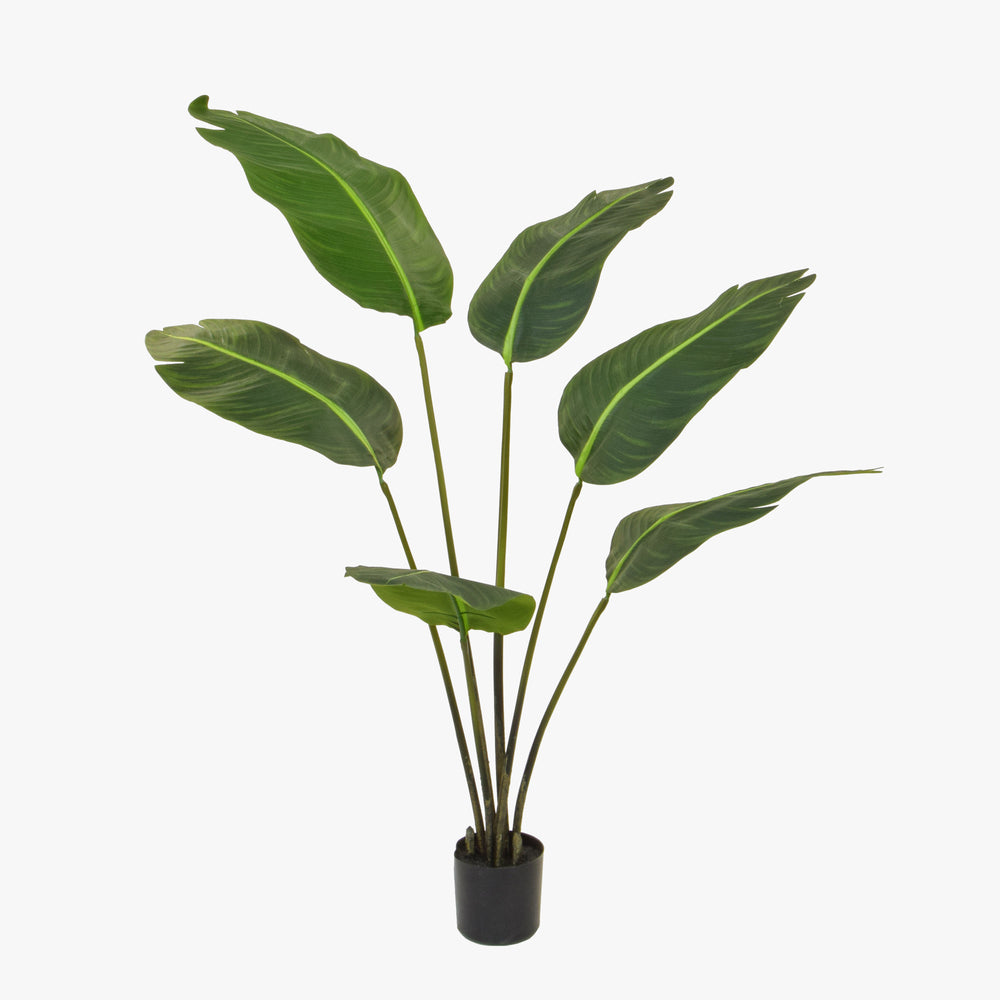 Artificial potted plant with green leaves on a white background