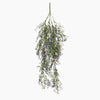 Hanging bundle of greenery with small purple flowers on a white background