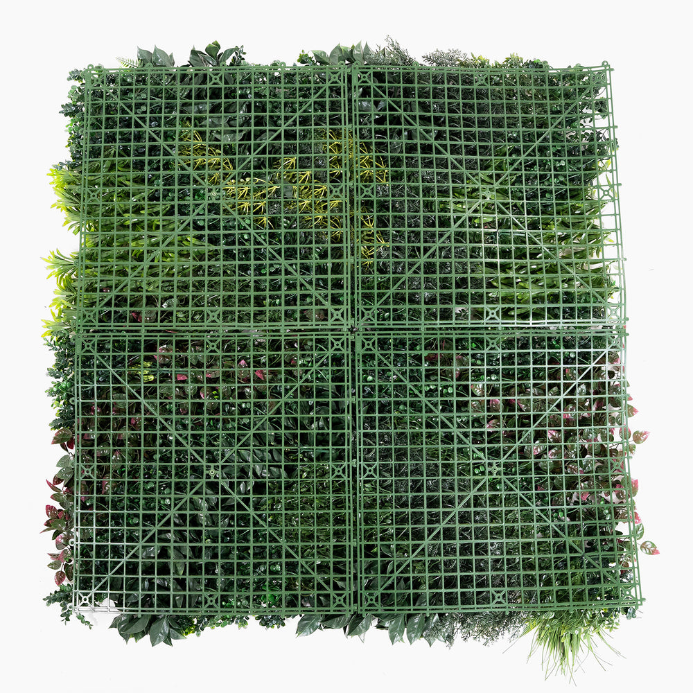 Square grid of artificial greenery on a white background