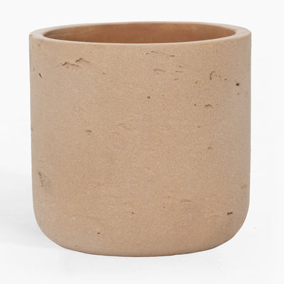 Beige ceramic planter on a white background