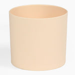 Beige cylindrical pot on a white background