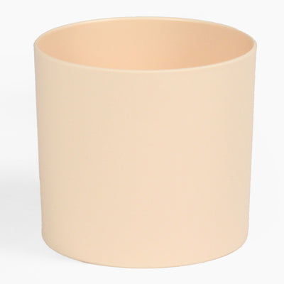 Beige cylindrical pot on a white background
