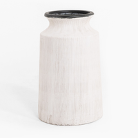 White textured vase with black rim on a white background