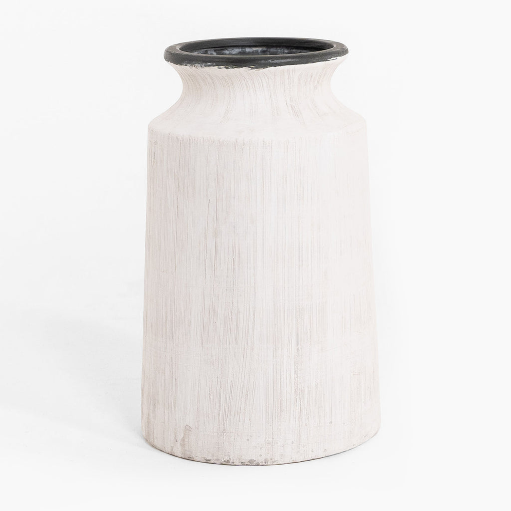 White textured vase with black rim on a white background