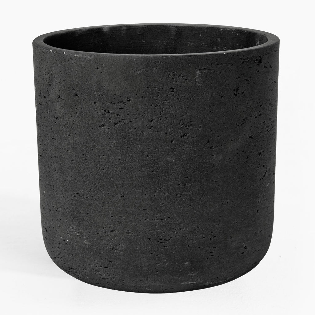 Black cylindrical pot on a white background