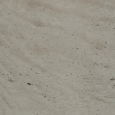 Close-up of a textured beige surface with small variations in color.