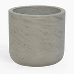 Concrete pot with textured surface on a white background