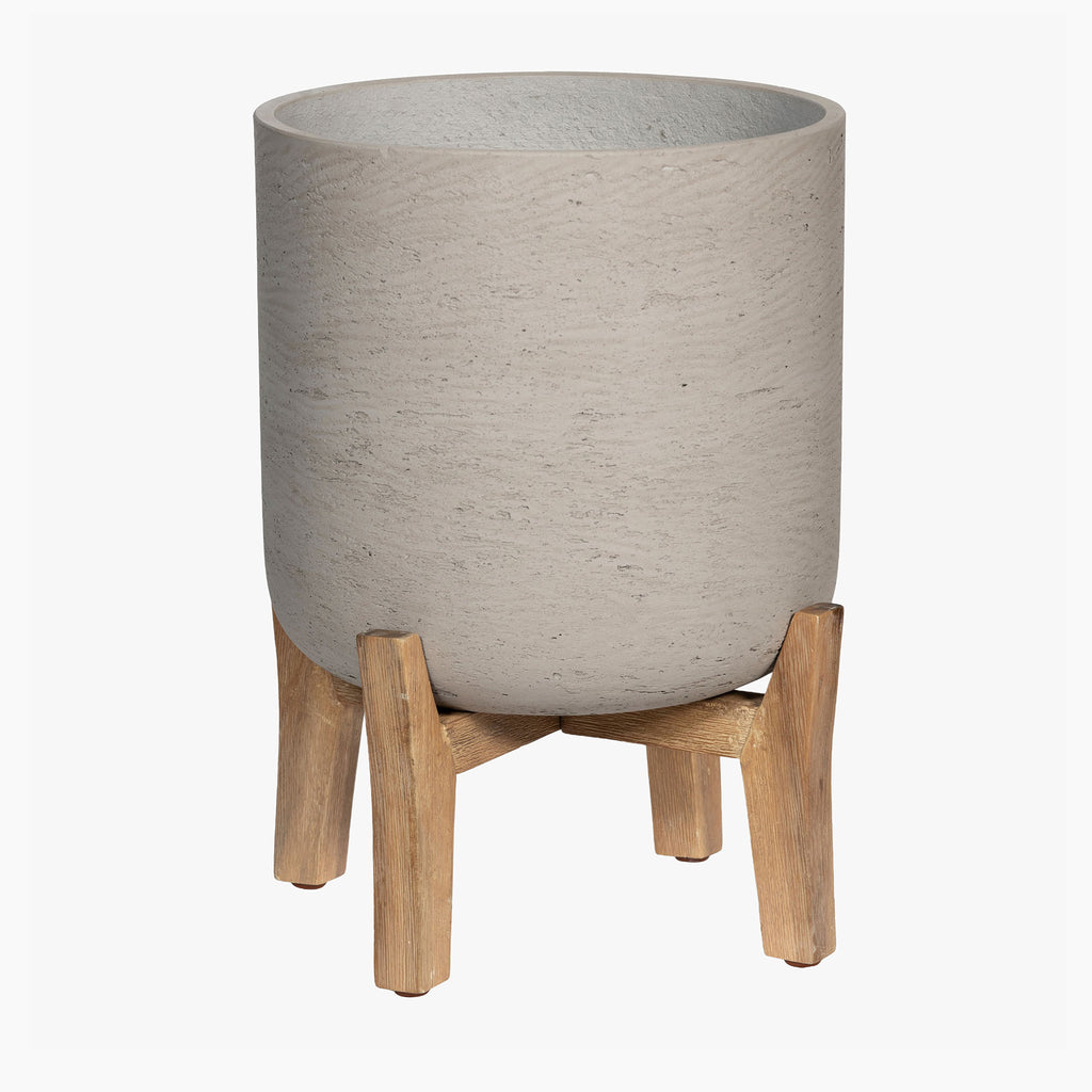Gray textured planter with wooden stand on a white background