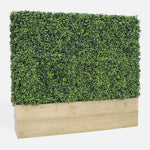 Artificial hedge in a wooden planter on a white background