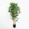 Potted artificial bamboo plant on a white background