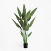 Artificial potted plant with green leaves on a white background