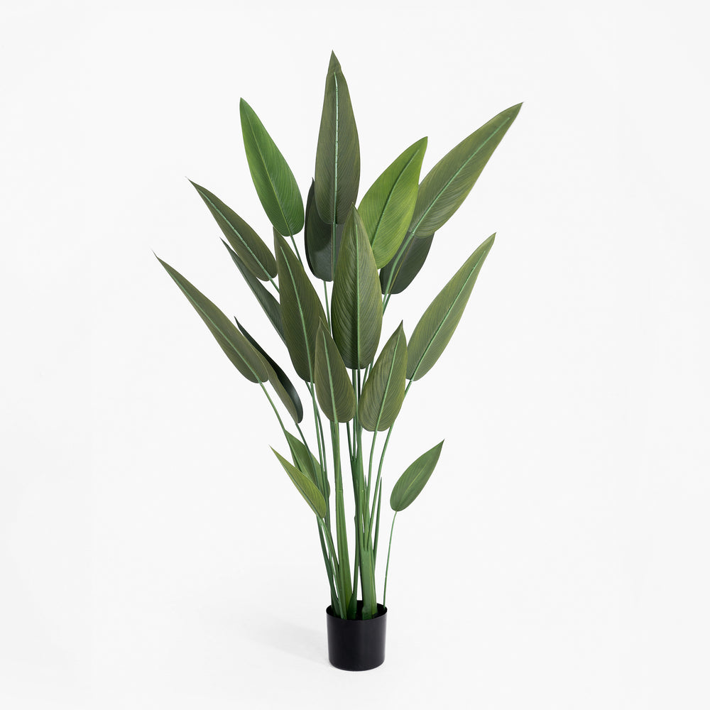 Artificial potted plant with green leaves on a white background