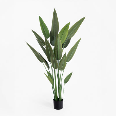 Artificial potted plant with green leaves on a white background