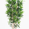 Artificial bamboo plant with green leaves on a white background