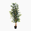 Artificial potted plant with green leaves on a white background