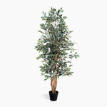 Artificial potted plant with green leaves on a white background