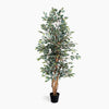 Artificial potted plant with green leaves on a white background