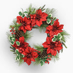 Christmas wreath with red flowers, greenery, and pinecones on a white background