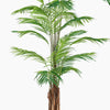 Artificial palm tree with green leaves on a white background
