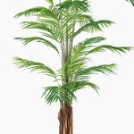 Artificial palm tree with green leaves on a white background