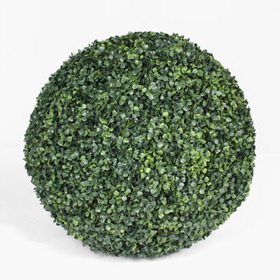 Artificial boxwood ball on a white background